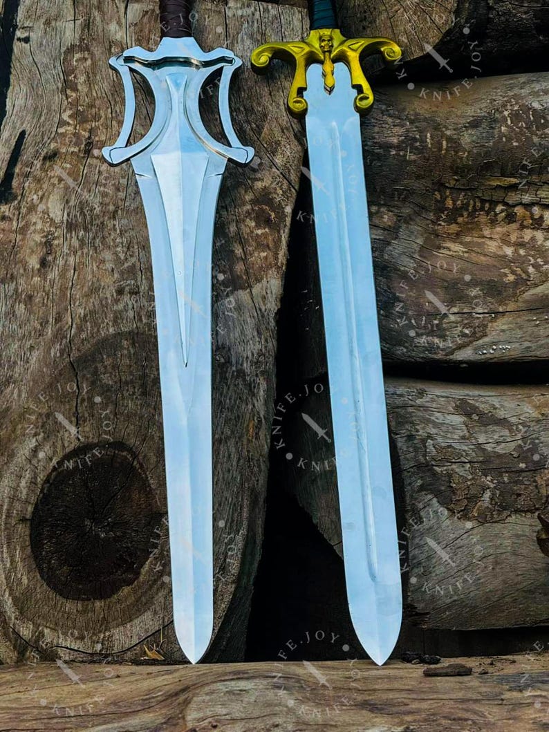 Close up of carbon steel blade He Man power sword replica showing detailed finish and craftsmanship