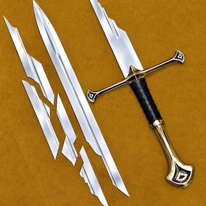 May include: A sword with a polished silver blade and a gold-toned crossguard and pommel. The handle is wrapped in black material. The blade is depicted in several fragmented, angular pieces arranged in a linear pattern alongside the hilt.