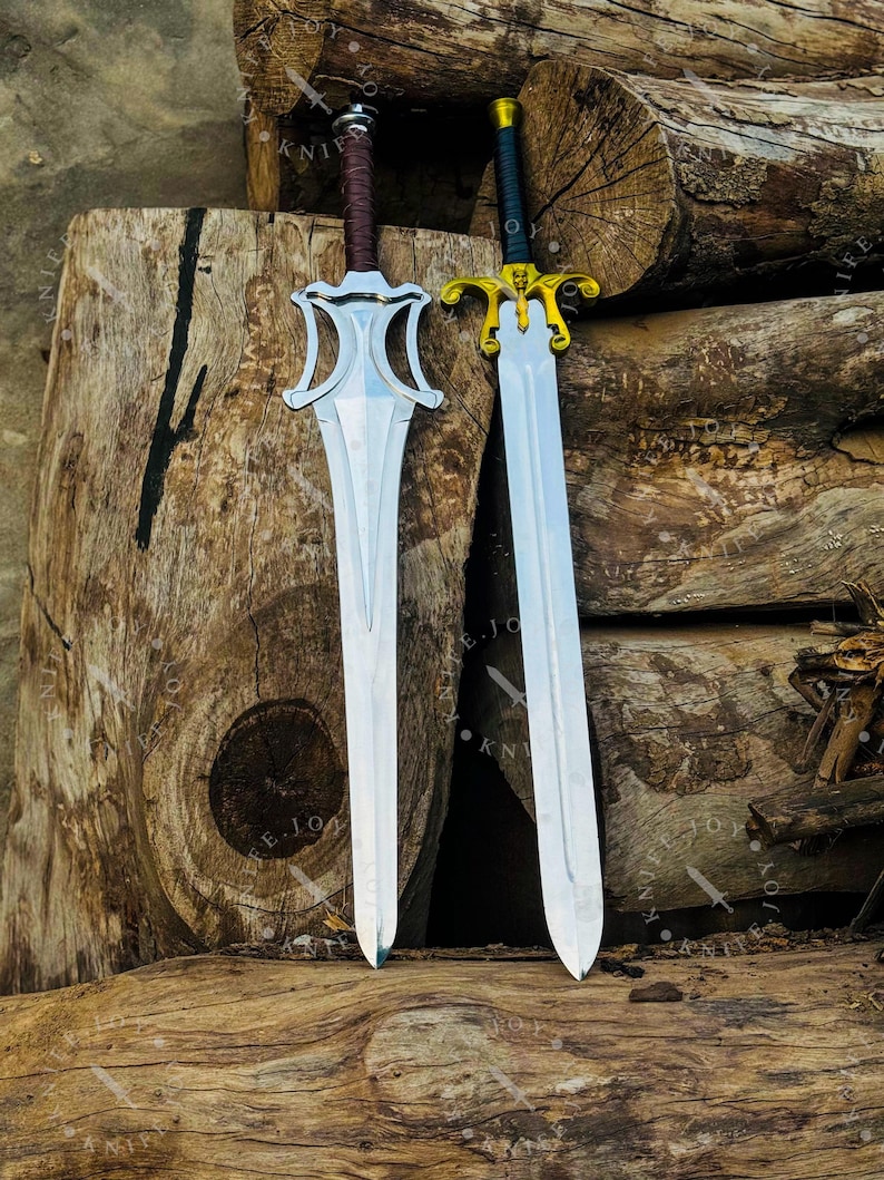 Handmade He Man sword set displayed on wooden table fantasy collector piece Masters of the Universe inspired