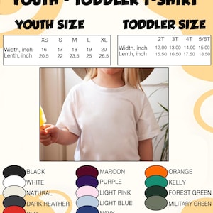May include: A white youth and toddler t-shirt. The image includes size charts for youth and toddler sizes, with measurements in inches. Available colours include black, white, natural, dark heather, and red.