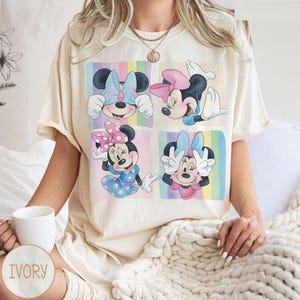 May include: A set of three ceramic mugs with a speckled, matte finish. The mugs are in shades of cream, light gray, and dark gray. Each mug has a simple, minimalist design, perfect for coffee or tea.