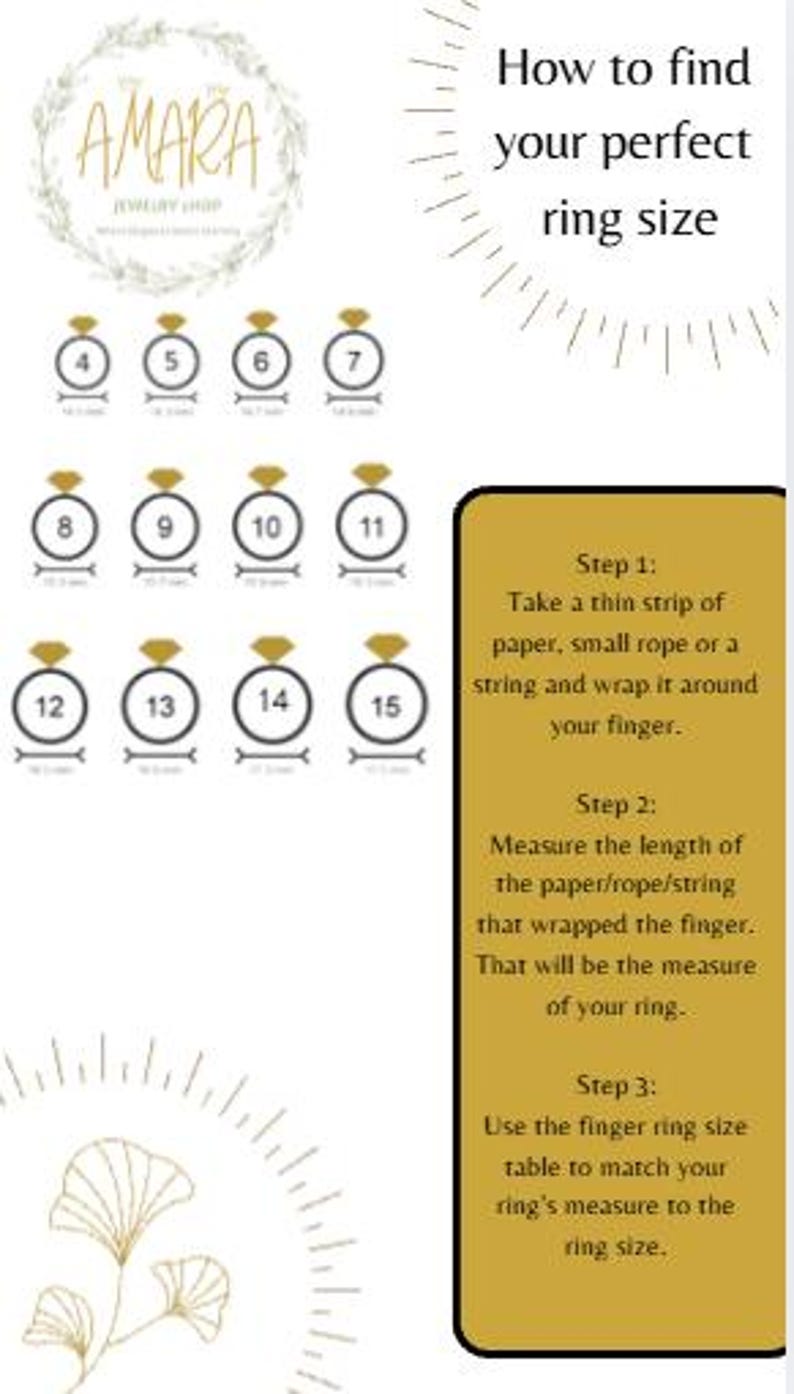 Puede incluir: Una tabla de tallas de anillos con el logotipo de Amara Jewelry Shop, iconos de anillos numerados del 4 al 15 con medidas en mil&iacute;metros y un cuadro de texto dorado que detalla tres pasos para medir el dedo con papel, cuerda o cordel.