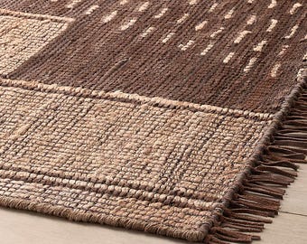 Alfombras y tapices. Alfombra tejida a mano de yute y cuero: Alfombra artesanal moderna de estilo rústico.