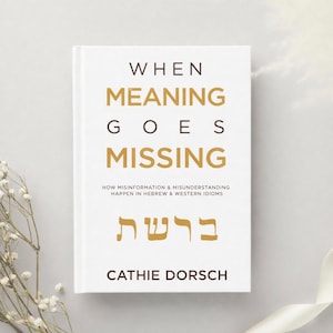 May include: A white book titled "When Meaning Goes Missing" with gold lettering. The book's subtitle discusses misinformation in Hebrew and Western idioms. The author's name, Cathie Dorsch, is at the bottom.