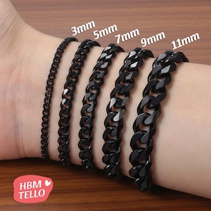 May include: A variety of black curb chain bracelets in different widths, from 3mm to 11mm, are displayed on a wrist. The bracelets are made of a shiny, dark material. The image includes text indicating the chain widths.