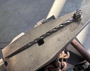 Varita forjada a mano.