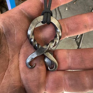 Hand forged Troll Cross pendant.