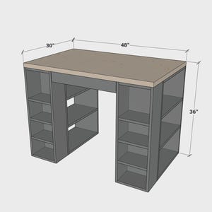 May include: A gray desk with a light brown top. The desk is 48 inches wide, 30 inches deep, and 36 inches high. It has built-in shelving units on each side, providing storage space. The design is modern and functional.