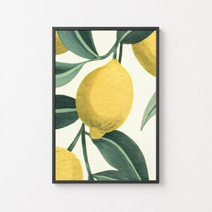 Peut inclure: Impression d'art encadrée représentant des citrons jaunes et des feuilles vertes sur fond blanc cassé. L'œuvre est dans un cadre noir. Les citrons et les feuilles sont peints en gros plan.