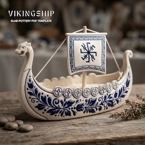 May include: A cream-colored ceramic Viking ship model featuring blue floral patterns along the hull, a square sail with a blue geometric symbol, and a carved dragon head prow. The text VIKINGSHIP SLAB POTTERY PDF TEMPLATE is visible.