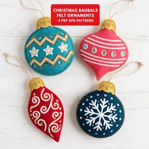 May include: Four felt Christmas bauble ornaments with hanging strings. The set includes a teal round ornament with stars, a pink onion-shaped ornament with sequins, a red teardrop ornament with swirls, and a dark blue round ornament with a snowflake.