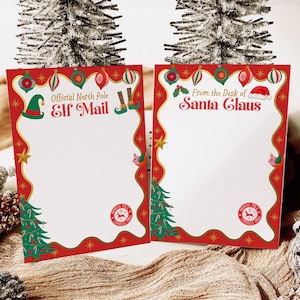 May include: Two rectangular stationery sheets with red borders and Christmas motifs. The left sheet reads Official North Pole Elf Mail. The right sheet reads From the Desk of Santa Claus. Both feature a North Pole Express Mail stamp.