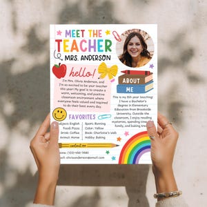 May include: A Meet the Teacher flyer for Mrs. Anderson featuring a photo of a smiling person, a red apple, a yellow bow, a stack of books, a smiley face, and a rainbow. The text includes a personal introduction, favorites, and contact details.
