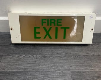 Señal de salida de incendios retro