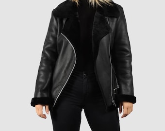 Chaqueta de aviador de cuero auténtico con forro de piel de oveja negra para mujer, abrigo de invierno hecho a mano.