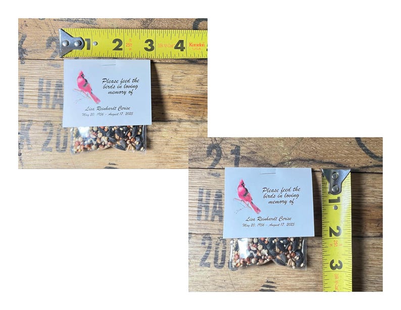 two small packages of birdseed placed on a wooden surface. The packages are labeled with a message about the memory of a loved one, likely a bird. The image also includes a yellow measuring tape, which is placed on the wooden surface.