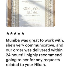 May include: Framed wedding certificate with gold accents and Arabic calligraphy. The names "Muhammad Umar" and "Safeena Khan" are displayed in elegant script. The frame is a light brown color.