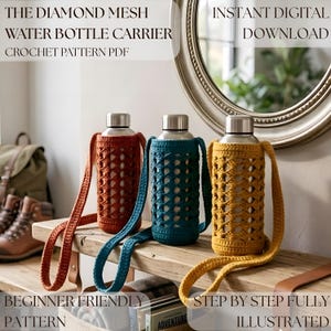 May include: Three stainless steel water bottles encased in crocheted diamond mesh carriers with long shoulder straps. The carriers are in rust orange, teal, and mustard yellow. Text reads: THE DIAMOND MESH WATER BOTTLE CARRIER CROCHET PATTERN PDF, INSTANT DIGITAL DOWNLOAD, BEGINNER FRIENDLY PATTERN, STEP BY STEP FULLY ILLUSTRATED.