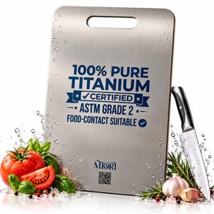 May include: A rectangular silver titanium cutting board with a handle cutout, featuring blue text that reads 100% PURE TITANIUM CERTIFIED ASTM GRADE 2 FOOD-CONTACT SUITABLE and MIORI with a QR code. A silver kitchen knife is placed beside it.