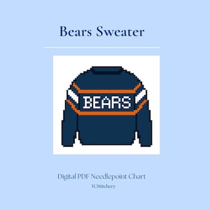 Könnte beinhalten: Digitales PDF-Nadelkissen-Diagramm eines marineblauen Pullovers mit dem Wort "BEARS" in weißen Blockbuchstaben auf der Brust. Das Pullover-Design umfasst orangefarbene und weiße Streifen. Der Text "Bears Sweater" steht oben.