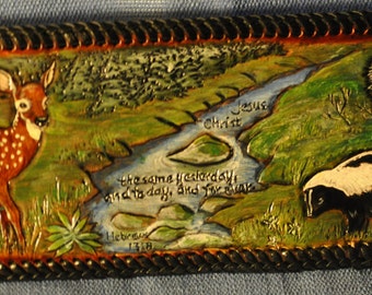 Customized handcarved leather wallet with skunk, fawn, and Bible verse
