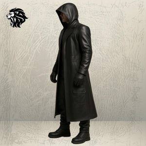 May include: A long black leather coat with a hood, worn with matching black leather gloves, black trousers, and black boots. The coat features a structured collar, long sleeves, and a large rectangular pocket on the lower front side of the garment.
