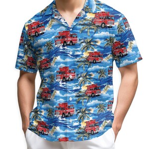 May include: Blue Hawaiian shirt featuring a repeating pattern of red fire trucks, palm trees, and ocean waves. The short-sleeved shirt has a button-down front and a relaxed fit, perfect for a casual look. The shirt is made of a lightweight fabric.