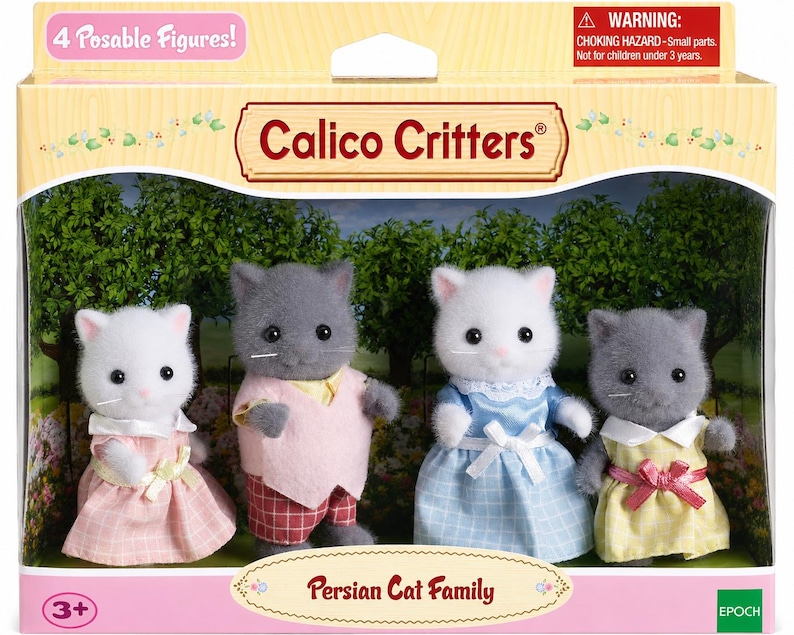 May include: A Calico Critters Persian Cat Family set featuring four posable cat figures in a box. The figures include two white cats and two gray cats wearing fabric clothing, including dresses, a vest, and trousers, with the text Persian Cat Family.