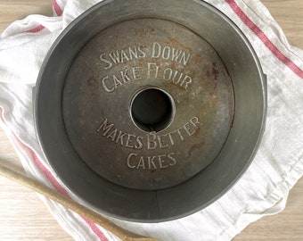 E. Katzinger Co. Swans Down Cake Flour pan - 1920s vintage
