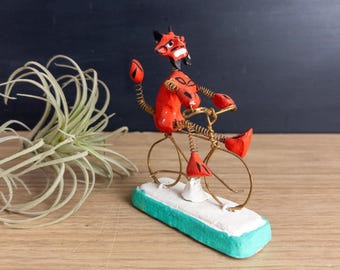 Mexican Folk Art Clay Devil Riding Wire Bicycle Figurine - Day of the Dead
