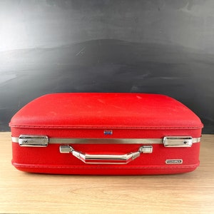 American Tourister Tourister red suitcase 1960s vintage image 1