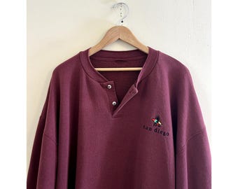 Vintage 90s Crazy Shirts San Diego Embroidered Surfer Henley Collar Sweatshirt