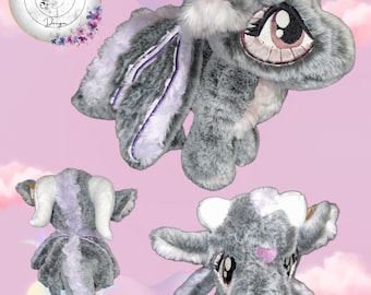 Peluche de dragón de pie con mariposa
