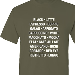 May include: A green t-shirt with white text listing different types of coffee drinks, including black, latte, espresso, doppio, galão, affogato, cappuccino, white, macchiato, mocha, flat, café au lait, americano, Irish, cortado, red eye, ristretto, and lungo.