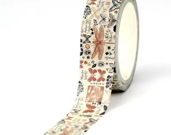 May include: A roll of decorative washi tape with a cream background and a repeating pattern of butterflies, dragonflies, and floral elements in shades of brown and black. The tape also features handwritten script.