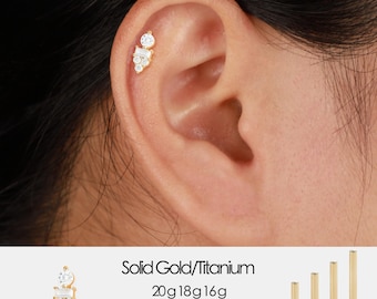 Aretes tipo botón con forma de caracola, sin rosca, con diamantes de laboratorio en oro macizo de 14 quilates y parte trasera plana