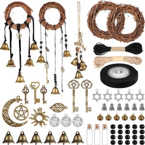 May include: A craft kit containing two grapevine wreaths, brass-colored bells, metal keys, star and moon charms, tree pendants, black and jute twine, a roll of black ribbon, small glass vials, and black beads for creating hanging decorations.