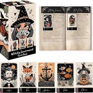 May include: A Witchy Lenormand tarot deck box featuring a witch illustration, an open guidebook showing pages 33 and 34, and five individual cards depicting a man, a fox, an anchor, fish, and a clover, all with black, white, and orange details.