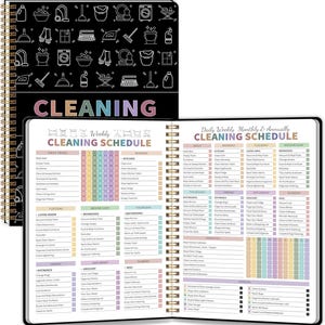May include: A spiral-bound cleaning schedule planner with a black cover featuring white line-art icons of household chores and the word CLEANING in pastel letters. The open pages display detailed daily, weekly, monthly, and annual task lists.