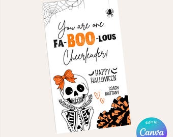 May include: A white printable Canva template with a Halloween theme. The design features a skeleton with an orange bow, text that reads "You are one FA-BOO-LOUS Cheerleader!" and "Happy Halloween". A spider and web are also included.