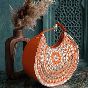 Indian bridal handbag with colorful embroidery and bead detailing