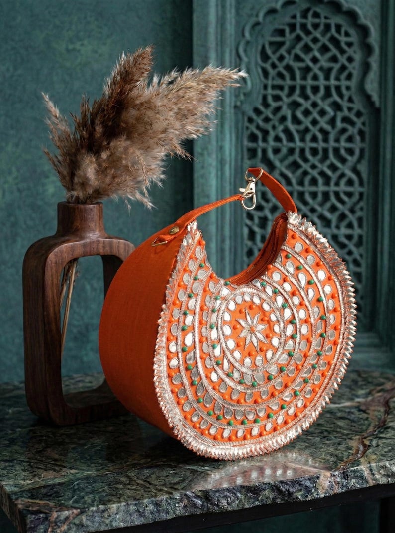 Indian bridal handbag with colorful embroidery and bead detailing