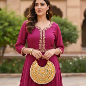 Traditional Indian potli bag with intricate gotta patti embroidery