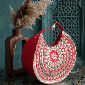 Luxury Indian bridal potli bag with intricate embroidery work