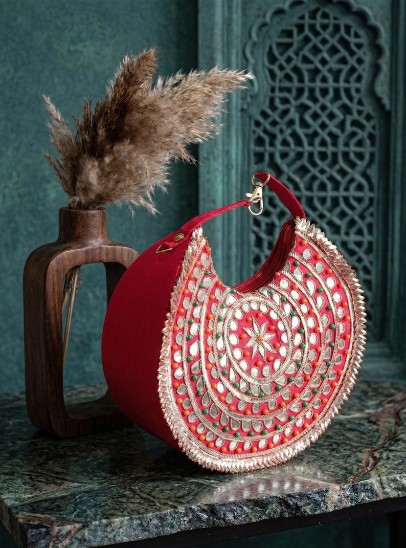 Luxury Indian bridal potli bag with intricate embroidery work