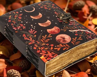 Diario grimorio de cuero con fases lunares grandes, candado antiguo, Libro de las Sombras en blanco
