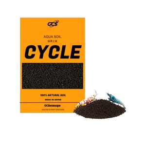 Peut inclure: Un emballage orange de "CYCLE" sol aquatique avec du texte en anglais et en japonais. Un tas de terre sombre et deux crevettes sont devant l'emballage. Le produit est pour aquariums.