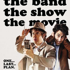 May include: Movie poster for "Nirvana: The Band, The Show, The Movie" featuring two men in suits. One holds a vintage radio, the other touches his head. Bold text at the top reads "nirvana the band the show the movie".
