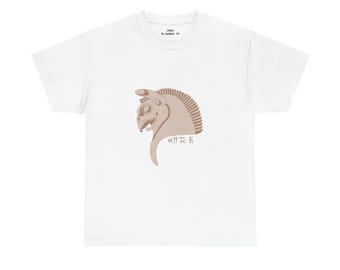 May include: White t-shirt featuring a tan-colored horse head design with a stylized mane and text. The shirt has a crew neck and short sleeves. The text "HOMA" is printed at the top.