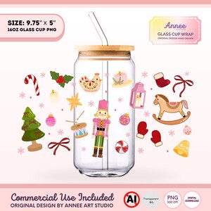 May include: A clear glass cup with a bamboo lid and a straw, decorated with Christmas-themed illustrations. The cup is 9.75 inches tall and 5 inches wide. The design includes a Christmas tree, ornaments, and a nutcracker. The text "16OZ GLASS CUP PNG" is visible.